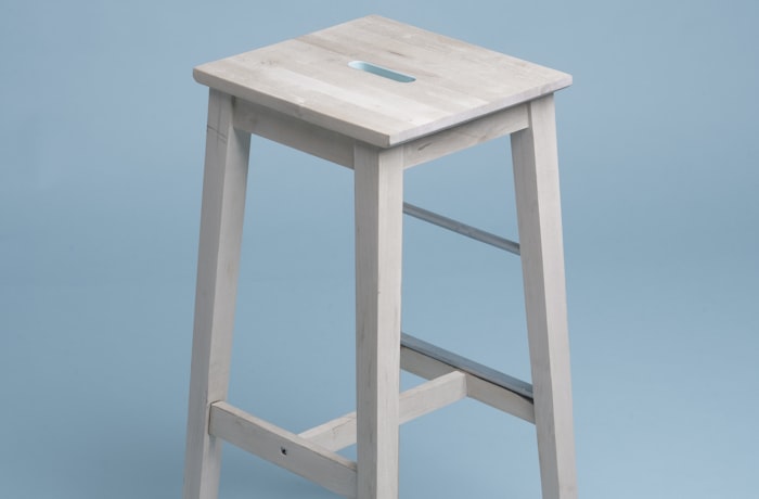 Craftsman working with reclaimed wood
